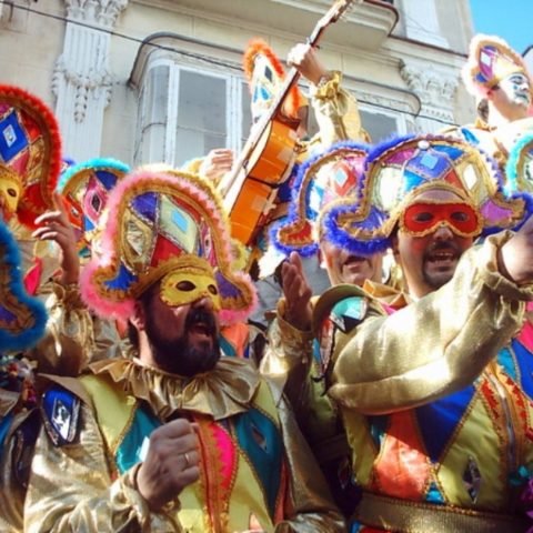carnaval cadiz Group of men in costume singing on the Cadiz Carnival Day Trip